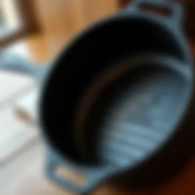 A detailed view of the interior surface of a cast iron grill pan highlighting its texture