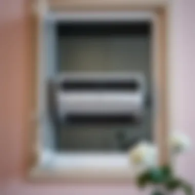 Close-up of a mobile air conditioning unit installed in a window frame
