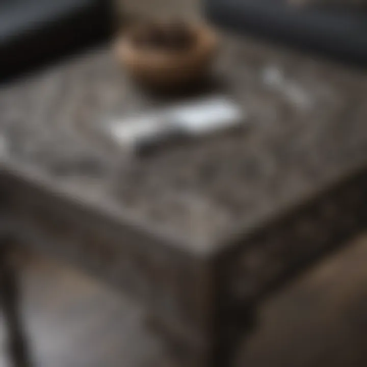 Close-up of intricate metalwork on a nesting table